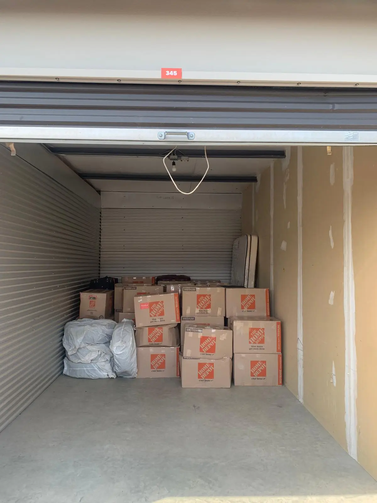 Climate-controlled storage facility with wrapped furniture